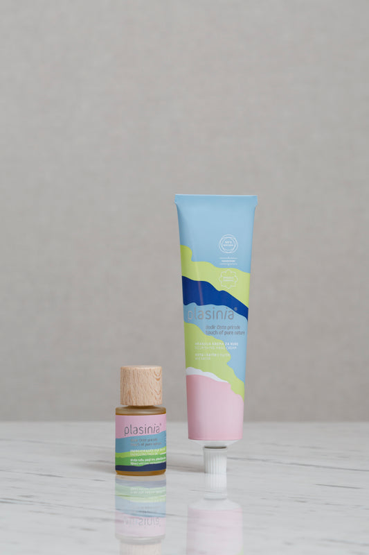 Two cosmetic products with colorful packaging on a gray background